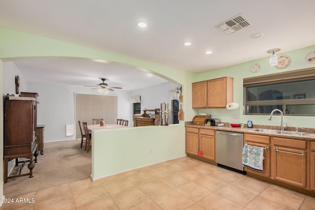 kitchen featuring dishwasher, light tile patterned floors, ceiling fan, and sink