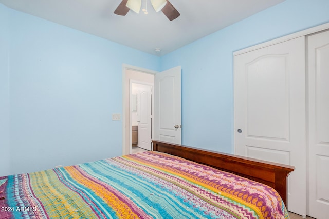 bedroom featuring ceiling fan and a closet