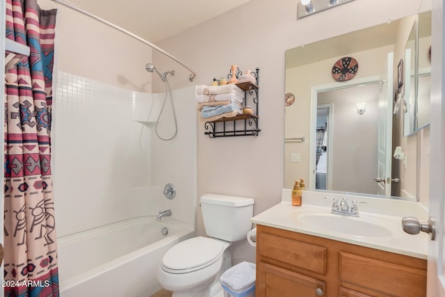 full bathroom with vanity, toilet, and shower / tub combo