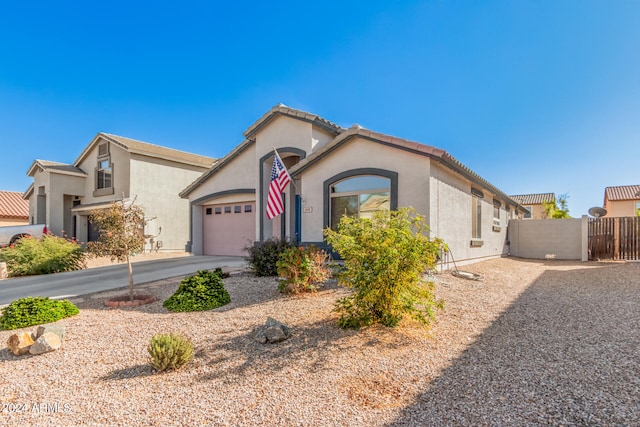 view of front of home featuring a garage