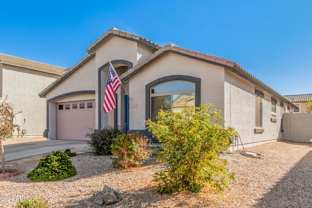 view of front of property featuring a garage