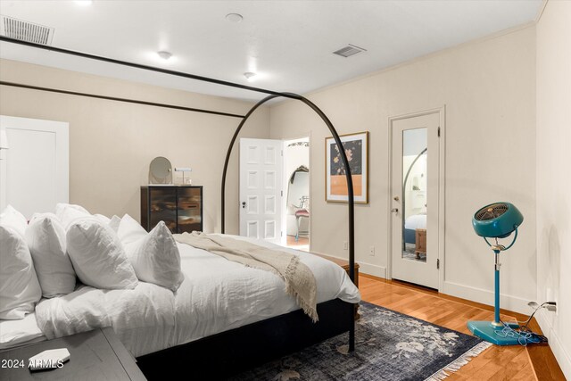 bedroom featuring hardwood / wood-style flooring