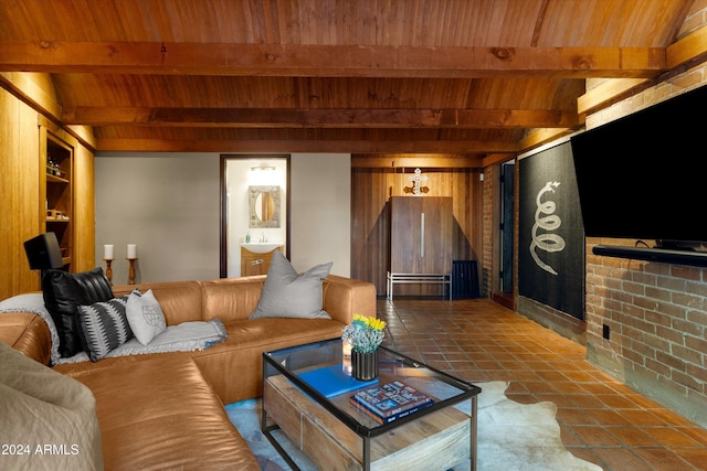 living room featuring beamed ceiling and wood ceiling