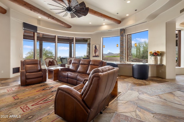 living room featuring a healthy amount of sunlight