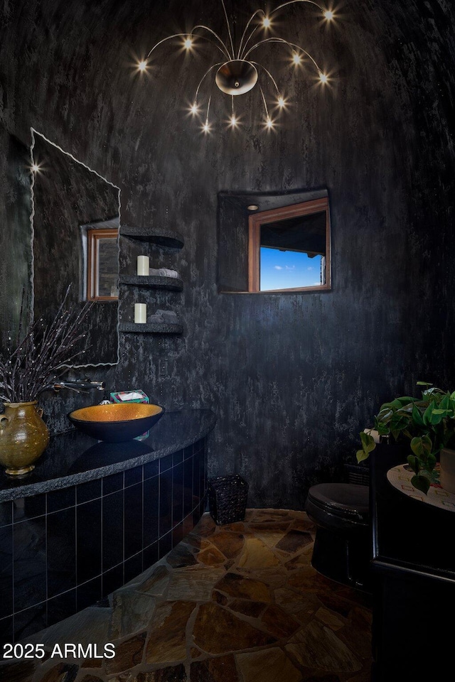 11105 E Tamarisk Way, Scottsdale, AZ 85262 - bathroom featuring toilet and stone floors