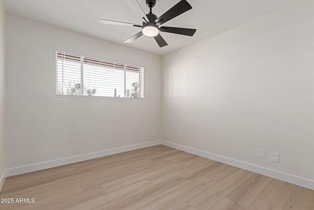 unfurnished room featuring ceiling fan and light hardwood / wood-style floors