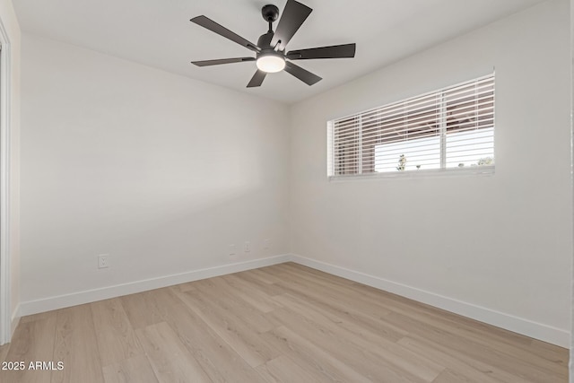 unfurnished room with ceiling fan and light wood-type flooring