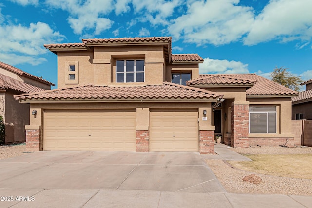 mediterranean / spanish-style home featuring a garage