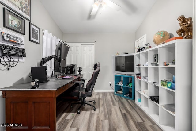 office with ceiling fan, wood finished floors, and baseboards