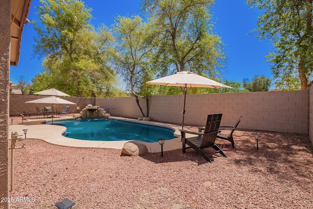 view of pool with a fenced in pool, a patio, and a fenced backyard