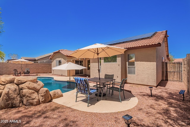 view of pool with a fenced in pool, a patio area, and a fenced backyard