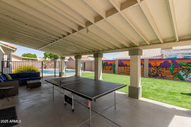view of patio / terrace with a fenced in pool, a fenced backyard, and an outdoor hangout area