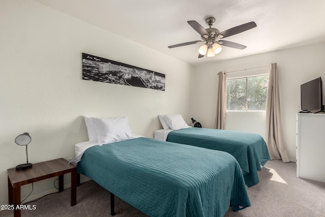 bedroom featuring carpet and a ceiling fan