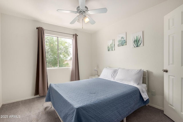 bedroom with baseboards, carpet flooring, and ceiling fan
