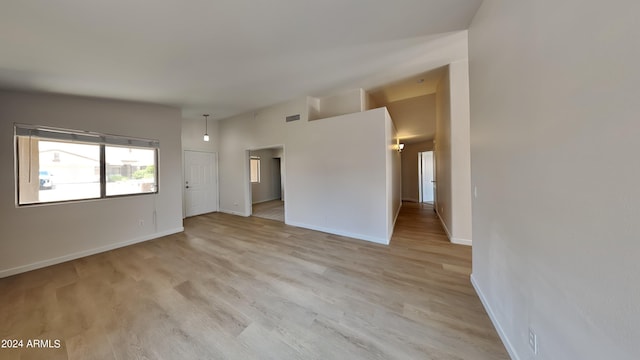 spare room with light wood-type flooring