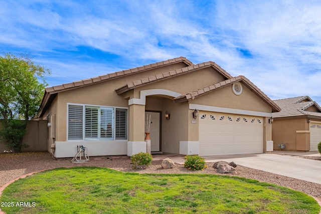 ranch-style home with stucco siding, driveway, a front yard, and a garage