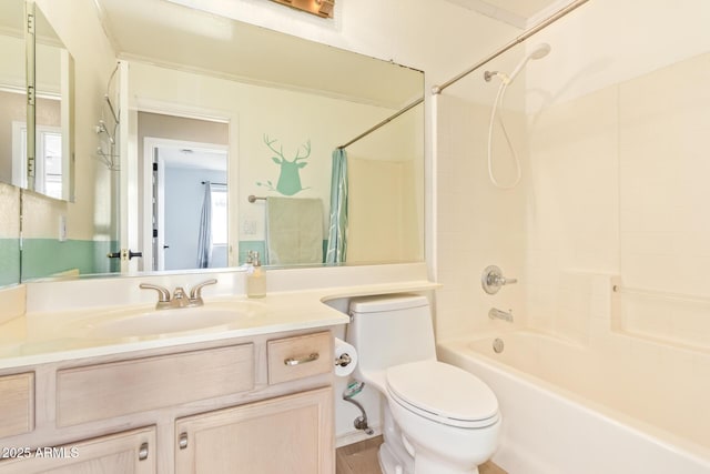 bathroom with bathing tub / shower combination, vanity, and toilet