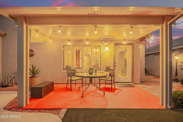 view of patio / terrace featuring fence and outdoor dining space