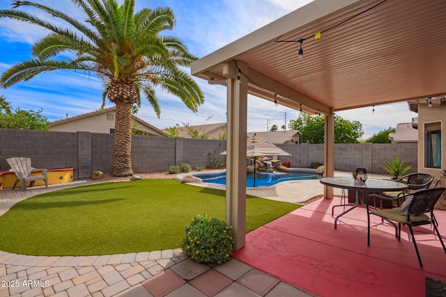 view of patio / terrace featuring a fenced in pool and a fenced backyard