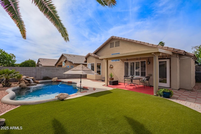view of pool featuring a lawn, a patio, a fenced in pool, and a fenced backyard