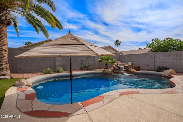 view of swimming pool with a fenced in pool, a fenced backyard, and a patio area
