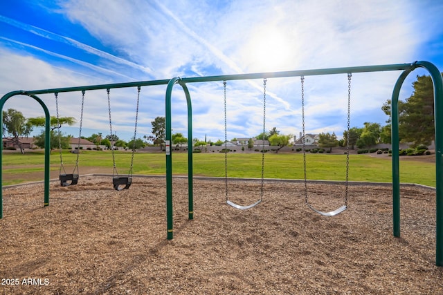 community playground featuring a yard