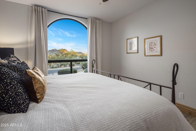 bedroom with wood-type flooring