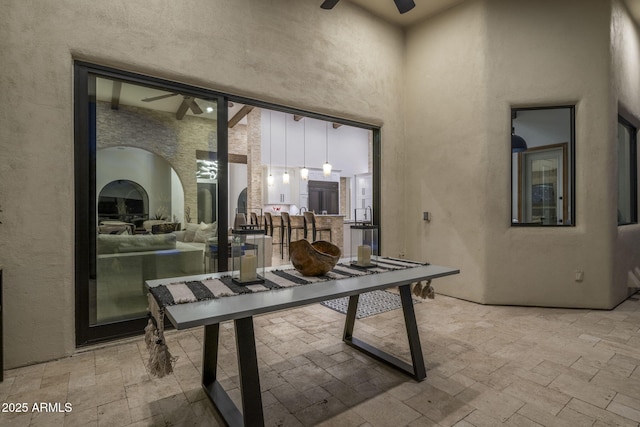 view of patio / terrace featuring ceiling fan