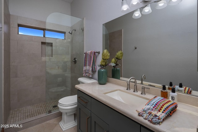 bathroom featuring tile patterned flooring, toilet, walk in shower, and vanity