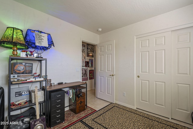 office area with light tile patterned floors