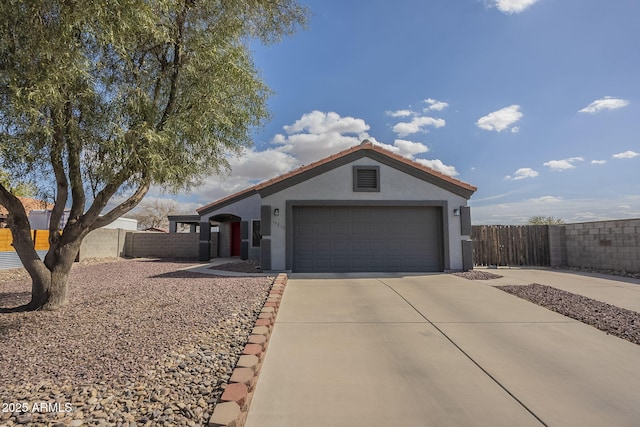 view of front of home with a garage