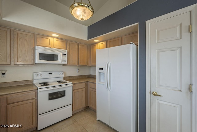 kitchen featuring white appliances, light brown cabinets, and light tile patterned flooring