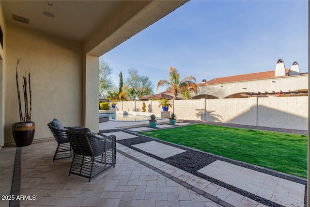 view of patio / terrace featuring visible vents, a fenced in pool, and a fenced backyard