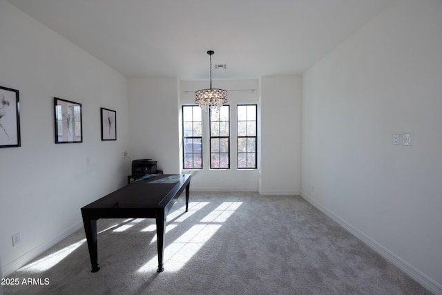 unfurnished office with light carpet and a notable chandelier