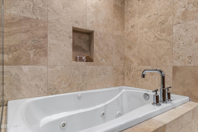 bathroom with a bath and tile walls