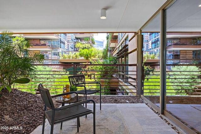 view of patio with a balcony