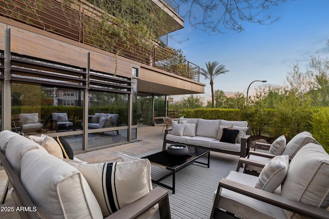 view of patio / terrace with outdoor lounge area and a balcony