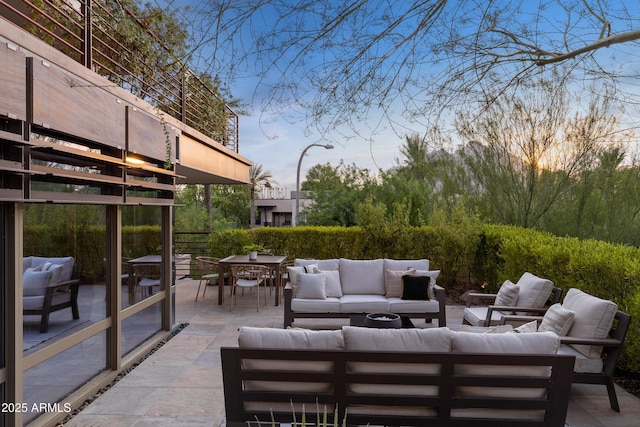 patio terrace at dusk with an outdoor hangout area