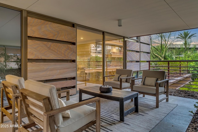 exterior space featuring an outdoor living space and a balcony