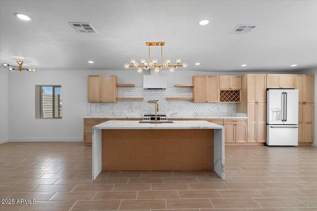 4400 N 20th St, Phoenix, AZ 85016 - kitchen with high end white refrigerator, open shelves, light brown cabinets, decorative backsplash, and recessed lighting