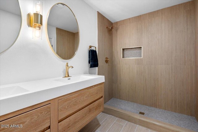 4400 N 20th St, Phoenix, AZ 85016 - bathroom featuring vanity and tiled shower