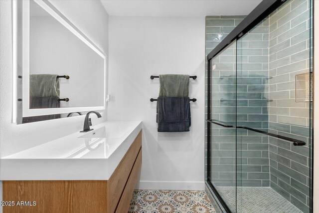 4400 N 20th St, Phoenix, AZ 85016 - bathroom with a shower stall, vanity, and tile patterned floors