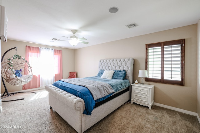 bedroom featuring ceiling fan and carpet floors