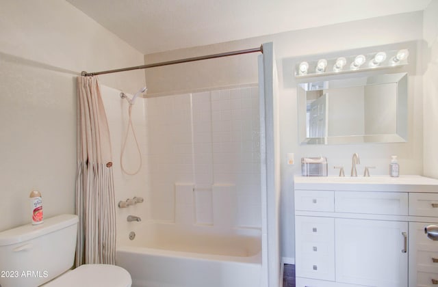 full bathroom featuring vanity, shower / tub combo, a textured ceiling, and toilet