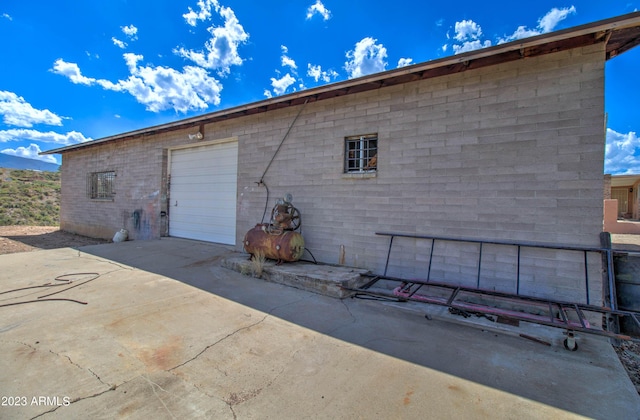 view of outdoor structure with a garage