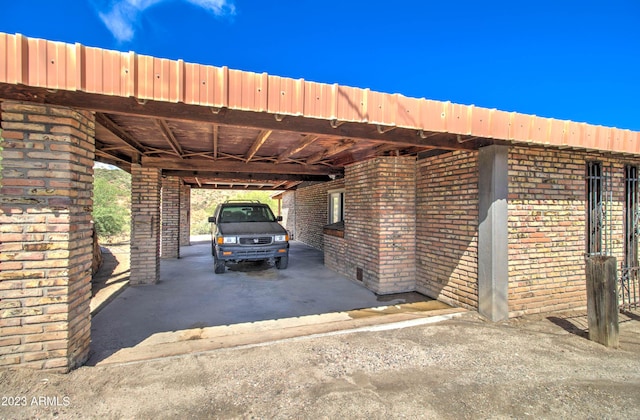 view of parking with a carport