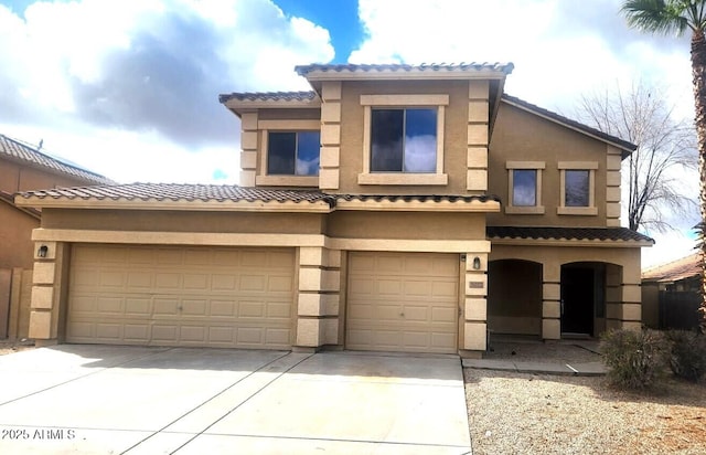 3057 E Pinto Valley Rd, San Tan Valley, AZ 85143 - mediterranean / spanish home with driveway, stucco siding, a tile roof, and a garage