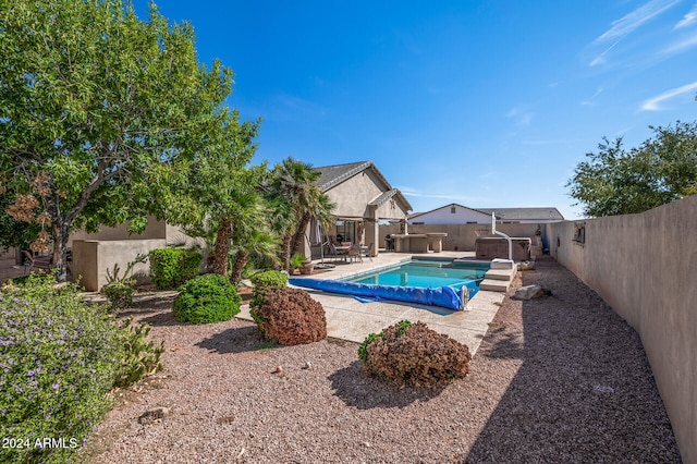 view of pool featuring a patio area