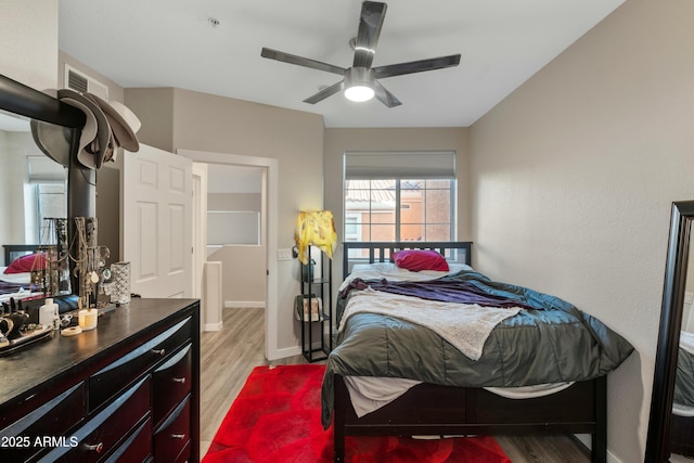 bedroom featuring ceiling fan and light wood-type flooring