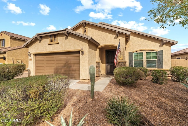 mediterranean / spanish-style house featuring a garage